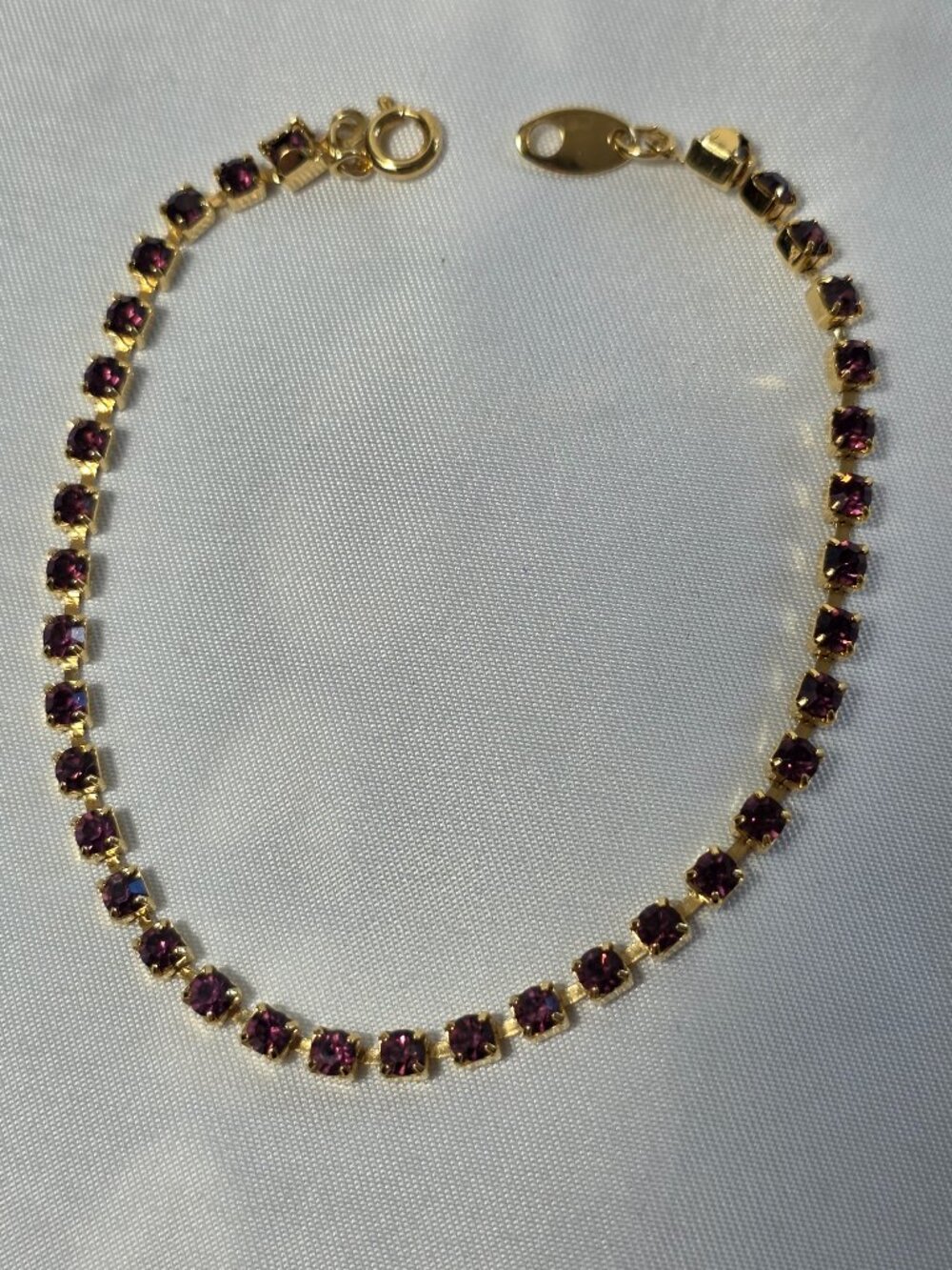 Avon Delicate Gold Tone Tennis Bracelet Red Rhinestones Size 7.75